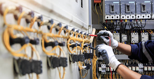 Professional Electrician technician working in Plantation, FL